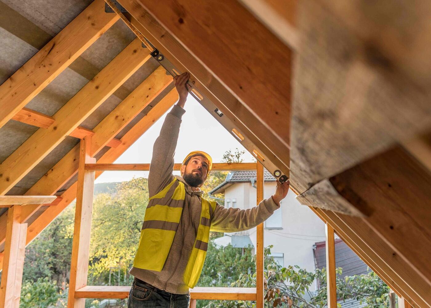 Carpenter framing a roof structure